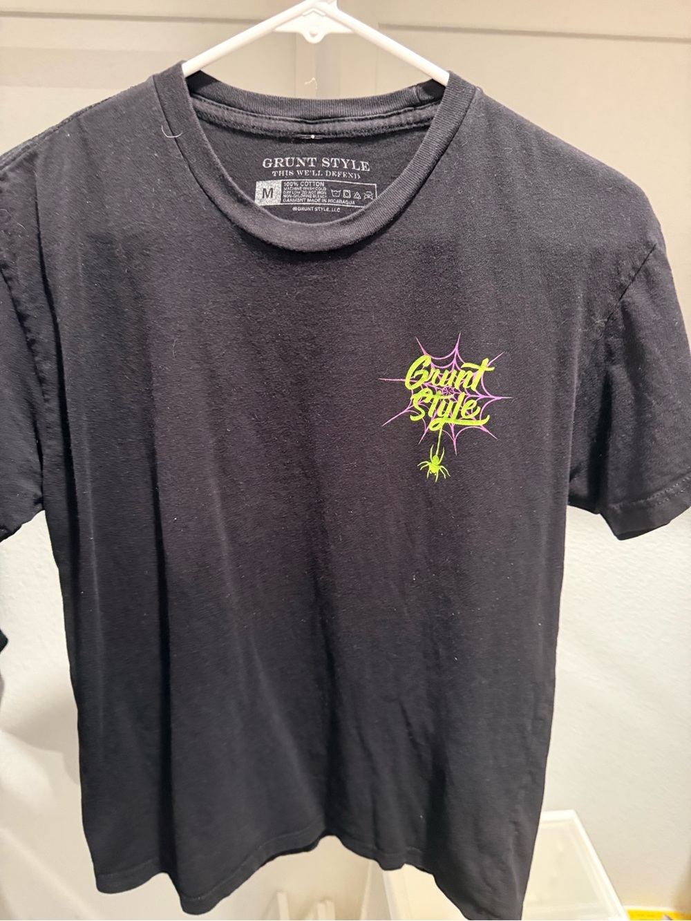 Grunt Style Black Short Sleeve Tee with Neon Green & Purple Logo